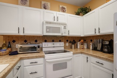 This Inviting, lakefront  2-bedroom 2-bath Villa is conveniently on South Padre Island Golf Club in Texas - for sale on GolfHomes.com, golf home, golf lot