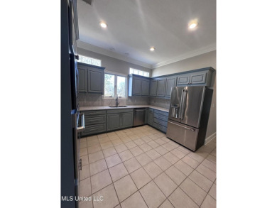 Welcome to this stunning golf course-front home in the in on Colonial Country Club Deerfield in Mississippi - for sale on GolfHomes.com, golf home, golf lot