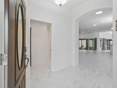 Welcome to refined Florida living in this exceptional Iris model on Pennbrooke Fairways in Florida - for sale on GolfHomes.com, golf home, golf lot