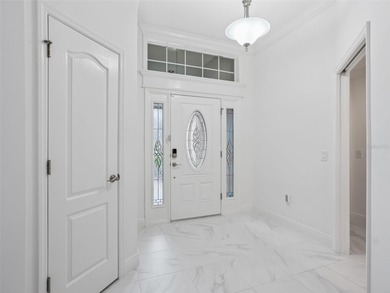 Welcome to refined Florida living in this exceptional Iris model on Pennbrooke Fairways in Florida - for sale on GolfHomes.com, golf home, golf lot