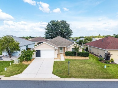 This popular Citation model is located in WINDWARD HILLS.   A on Eagle Ridge At Spruce Creek Country Club in Florida - for sale on GolfHomes.com, golf home, golf lot