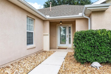 This popular Citation model is located in WINDWARD HILLS.   A on Eagle Ridge At Spruce Creek Country Club in Florida - for sale on GolfHomes.com, golf home, golf lot