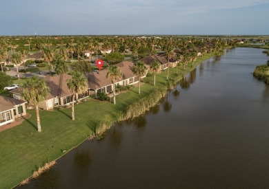 This Inviting, lakefront  2-bedroom 2-bath Villa is conveniently on South Padre Island Golf Club in Texas - for sale on GolfHomes.com, golf home, golf lot