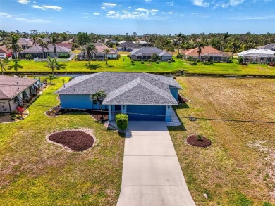 Charming 3-bedroom, 2-bathroom, canal-front home in the highly on Pinemoor West Golf Club in Florida - for sale on GolfHomes.com, golf home, golf lot