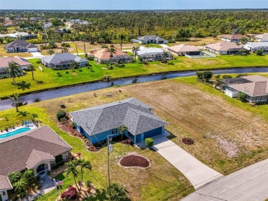 Charming 3-bedroom, 2-bathroom, canal-front home in the highly on Pinemoor West Golf Club in Florida - for sale on GolfHomes.com, golf home, golf lot