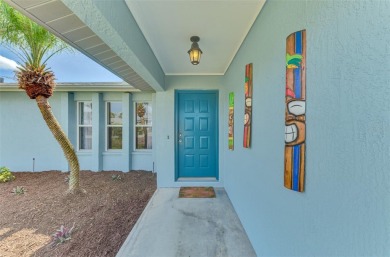 Charming 3-bedroom, 2-bathroom, canal-front home in the highly on Pinemoor West Golf Club in Florida - for sale on GolfHomes.com, golf home, golf lot