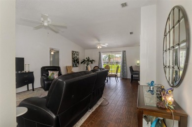 Charming 3-bedroom, 2-bathroom, canal-front home in the highly on Pinemoor West Golf Club in Florida - for sale on GolfHomes.com, golf home, golf lot