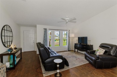 Charming 3-bedroom, 2-bathroom, canal-front home in the highly on Pinemoor West Golf Club in Florida - for sale on GolfHomes.com, golf home, golf lot