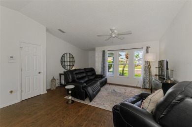 Charming 3-bedroom, 2-bathroom, canal-front home in the highly on Pinemoor West Golf Club in Florida - for sale on GolfHomes.com, golf home, golf lot