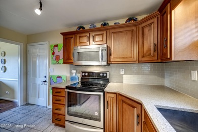 Classic charm meets modern comfort at 401 Edinburgh Pl, a on Hurstbourne Country Club in Kentucky - for sale on GolfHomes.com, golf home, golf lot