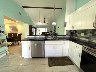 Beautifully renovated 2nd floor corner condo with expansive on Forest Oaks Golf Club in Florida - for sale on GolfHomes.com, golf home, golf lot