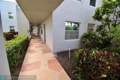 Beautifully updated, 2/2 first floor corner unit condo in King's on  in Florida - for sale on GolfHomes.com, golf home, golf lot