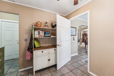 Welcome to this inviting ranch-style home nestled in a quiet on Indian Springs Country Club in Oklahoma - for sale on GolfHomes.com, golf home, golf lot