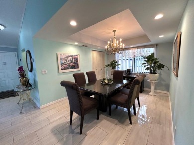 Beautifully renovated 2nd floor corner condo with expansive on Forest Oaks Golf Club in Florida - for sale on GolfHomes.com, golf home, golf lot