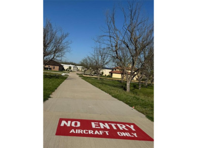 FLY IN  SEE THIS READY TO BUILD LOT BEFORE IT'S GONE! IF YOU on Pecan Plantation Country Club in Texas - for sale on GolfHomes.com, golf home, golf lot