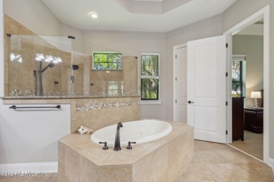 Welcome to this custom ICI home in the desirable gated golf on The Palencia Club in Florida - for sale on GolfHomes.com, golf home, golf lot