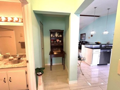 Beautifully renovated 2nd floor corner condo with expansive on Forest Oaks Golf Club in Florida - for sale on GolfHomes.com, golf home, golf lot