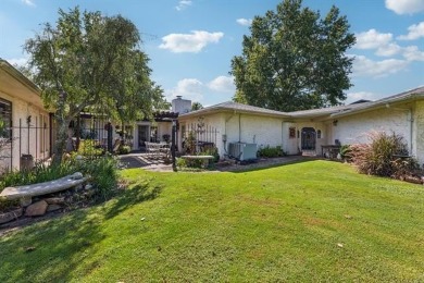 Welcome to this inviting ranch-style home nestled in a quiet on Indian Springs Country Club in Oklahoma - for sale on GolfHomes.com, golf home, golf lot