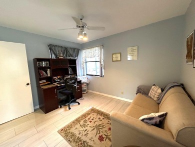 Beautifully renovated 2nd floor corner condo with expansive on Forest Oaks Golf Club in Florida - for sale on GolfHomes.com, golf home, golf lot