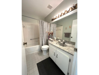 Beautifully renovated 2nd floor corner condo with expansive on Forest Oaks Golf Club in Florida - for sale on GolfHomes.com, golf home, golf lot