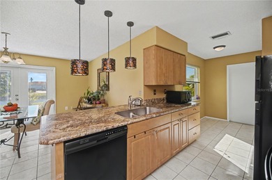 From the moment you arrive at 242 Annapolis Lane, you'll feel on Rotonda Golf and Country Club The Hills Course in Florida - for sale on GolfHomes.com, golf home, golf lot