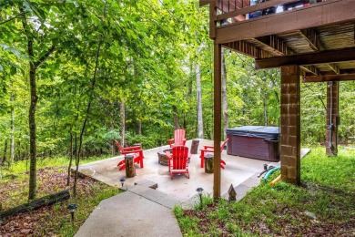 Escape to your own charming A-Frame chalet at Innsbrook Resort on Innsbrook Resort Golf Course in Missouri - for sale on GolfHomes.com, golf home, golf lot