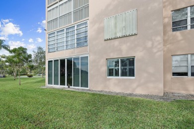 Rare gem Alert! Beautiful Remodeled 2BR/2BA 1st-floor end unit on Flamingo Lakes Country Club in Florida - for sale on GolfHomes.com, golf home, golf lot