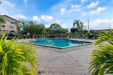 Rare gem Alert! Beautiful Remodeled 2BR/2BA 1st-floor end unit on Flamingo Lakes Country Club in Florida - for sale on GolfHomes.com, golf home, golf lot