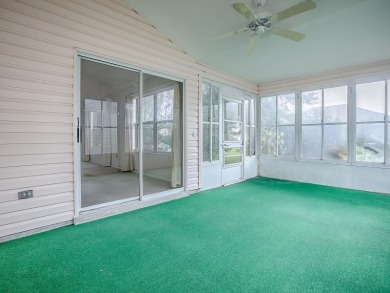 NO BOND on this Sable Key model within a short golf cart ride to on Orange Blossom Hills Golf and Country Club in Florida - for sale on GolfHomes.com, golf home, golf lot