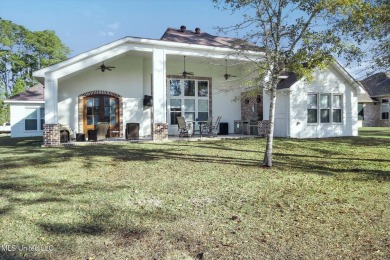 Breathtaking home from the instant you walk through the front on Diamondhead Country Club in Mississippi - for sale on GolfHomes.com, golf home, golf lot