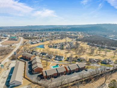 Step into this turn-key furnished condo, nestled in the elite on Pointe Royale Village Country Club in Missouri - for sale on GolfHomes.com, golf home, golf lot