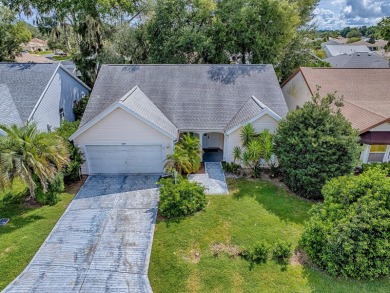 NO BOND on this Sable Key model within a short golf cart ride to on Orange Blossom Hills Golf and Country Club in Florida - for sale on GolfHomes.com, golf home, golf lot