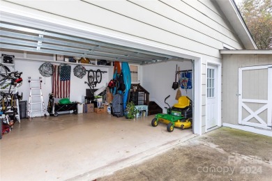 Beautiful single story ranch overlooking Pine Island Country on Pine Island Country Club in North Carolina - for sale on GolfHomes.com, golf home, golf lot