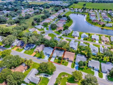 NO BOND on this Sable Key model within a short golf cart ride to on Orange Blossom Hills Golf and Country Club in Florida - for sale on GolfHomes.com, golf home, golf lot