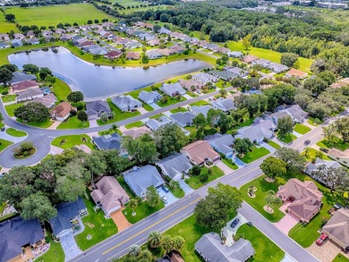 NO BOND on this Sable Key model within a short golf cart ride to on Orange Blossom Hills Golf and Country Club in Florida - for sale on GolfHomes.com, golf home, golf lot