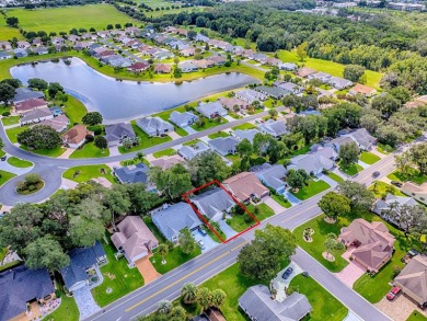 NO BOND on this Sable Key model within a short golf cart ride to on Orange Blossom Hills Golf and Country Club in Florida - for sale on GolfHomes.com, golf home, golf lot