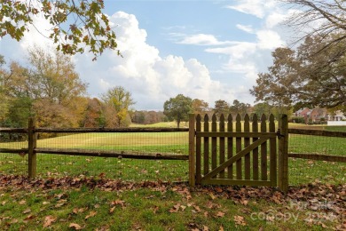 Beautiful single story ranch overlooking Pine Island Country on Pine Island Country Club in North Carolina - for sale on GolfHomes.com, golf home, golf lot