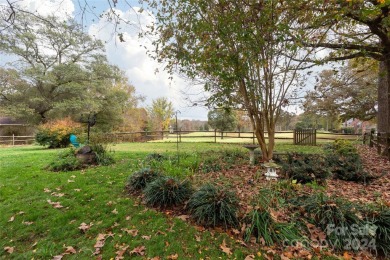 Beautiful single story ranch overlooking Pine Island Country on Pine Island Country Club in North Carolina - for sale on GolfHomes.com, golf home, golf lot