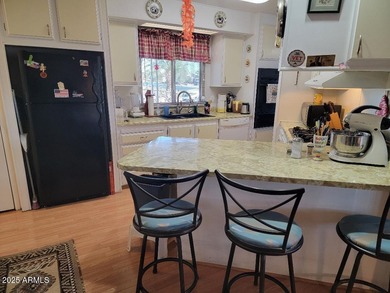 REDUCED! This is a lovely furnished 2 bedroom 2 bath home with on 3 Parks Fairways in Arizona - for sale on GolfHomes.com, golf home, golf lot