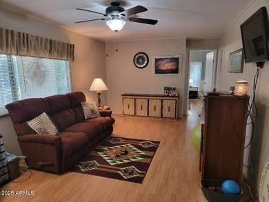 REDUCED! This is a lovely furnished 2 bedroom 2 bath home with on 3 Parks Fairways in Arizona - for sale on GolfHomes.com, golf home, golf lot