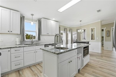 Freshly remodeled from top to bottom, this light-filled home on Pine Lakes Country Club in Florida - for sale on GolfHomes.com, golf home, golf lot