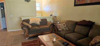 Come see this well decorated condo located right on the Gateway on Gateway Golf and Country Club in Florida - for sale on GolfHomes.com, golf home, golf lot