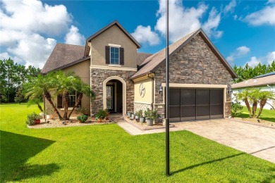 Absolutely stunning pool home in the beautiful 55+ golf on Stone Creek Golf Club in Florida - for sale on GolfHomes.com, golf home, golf lot