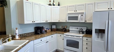 Come see this well decorated condo located right on the Gateway on Gateway Golf and Country Club in Florida - for sale on GolfHomes.com, golf home, golf lot