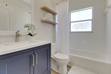 This private second-floor end unit residence is light & bright on Lely Resort Golf and Country Club in Florida - for sale on GolfHomes.com, golf home, golf lot