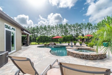 Absolutely stunning pool home in the beautiful 55+ golf on Stone Creek Golf Club in Florida - for sale on GolfHomes.com, golf home, golf lot