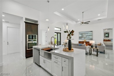 Move-in ready! This brand-new 3 bedroom, 3 bath + den pool home on Royal Tee Country Club in Florida - for sale on GolfHomes.com, golf home, golf lot