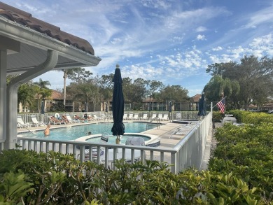 This private second-floor end unit residence is light & bright on Lely Resort Golf and Country Club in Florida - for sale on GolfHomes.com, golf home, golf lot