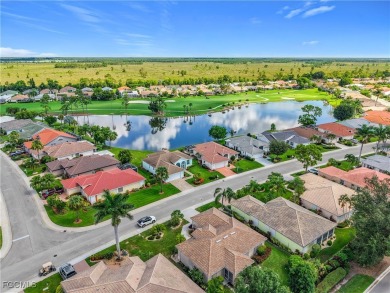 This pristine Ibis II model in HERONS GLEN COUNTRY CLUB sits in on Herons Glen Golf and Country Club in Florida - for sale on GolfHomes.com, golf home, golf lot