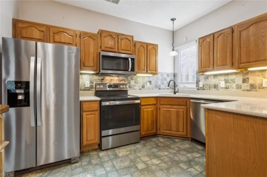 1st Floor Primary Bedroom Suite w/ Quartz & Low-Step Shower on Kiln Creek Golf and Country Club in Virginia - for sale on GolfHomes.com, golf home, golf lot